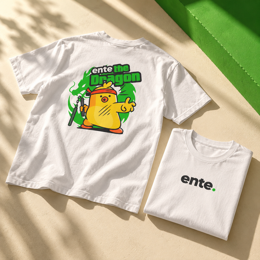 Ente white tee in sunlight with green scenery